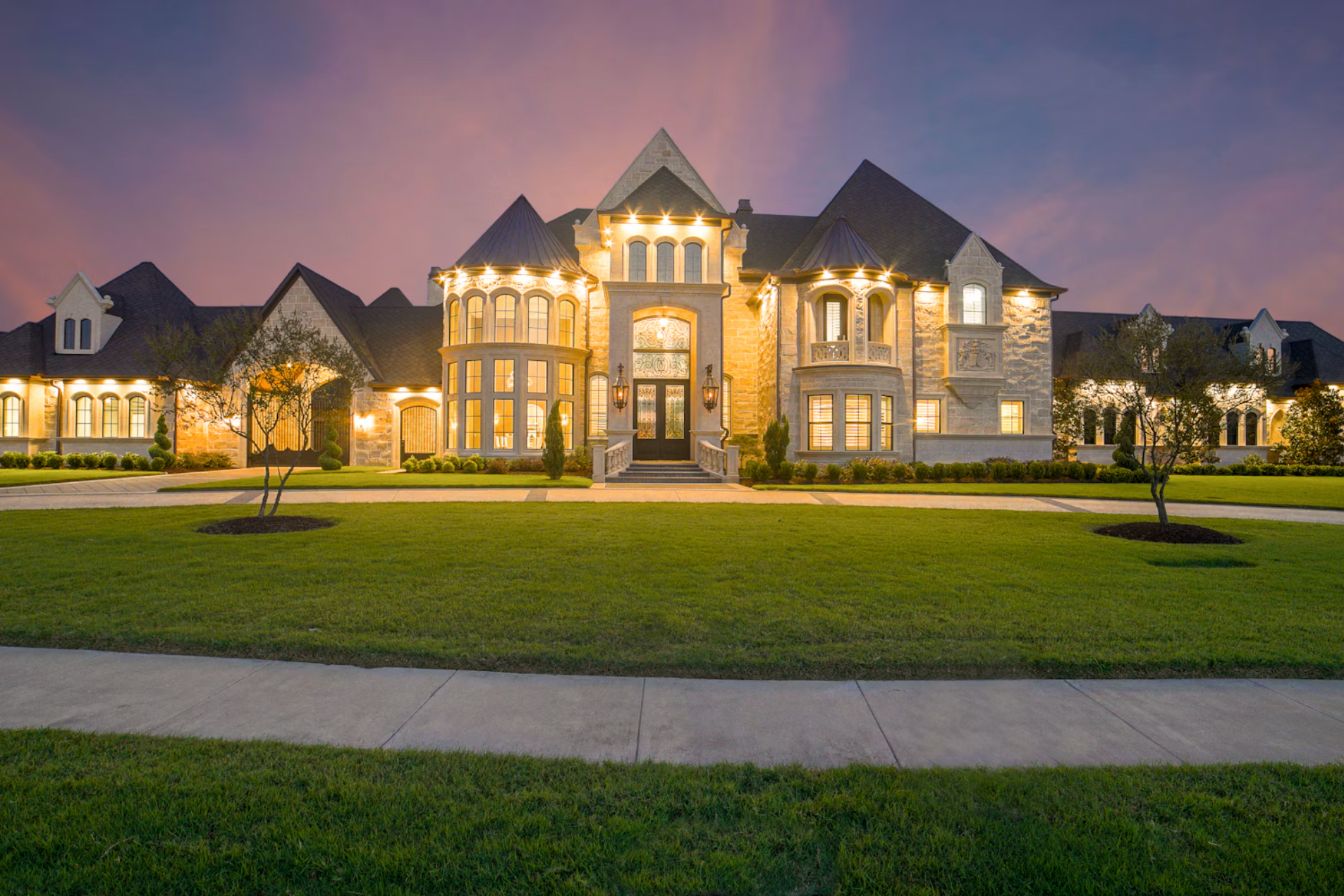 Private estate lit at dusk